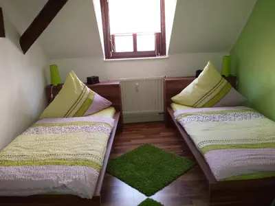 Ein Bett oder Betten in einem Zimmer der Unterkunft 4 JahresZeiten