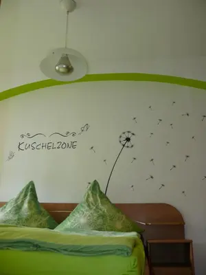 Ein Bett oder Betten in einem Zimmer der Unterkunft 4 JahresZeiten