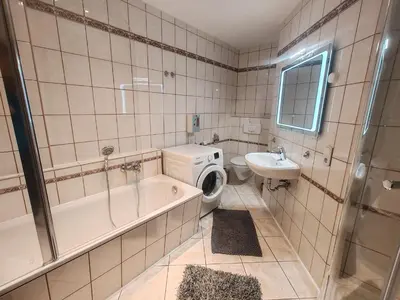 Ein Badezimmer in der Unterkunft Elbe Quartier Meissen TOP MONTEURUNTERKÜNFTE Wohnung 12