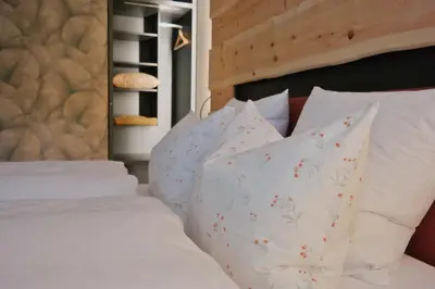 Ein Bett oder Betten in einem Zimmer der Unterkunft Ferienwohnungen FRENZELHOF ZUM KONJECHT