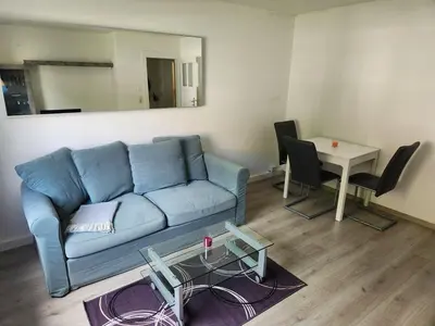 Ein Sitzbereich in der Unterkunft Ferienwohnung am Tharandter Wald