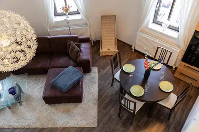 Ein Sitzbereich in der Unterkunft Macabu Premium Apartment Joker,Chemnitz