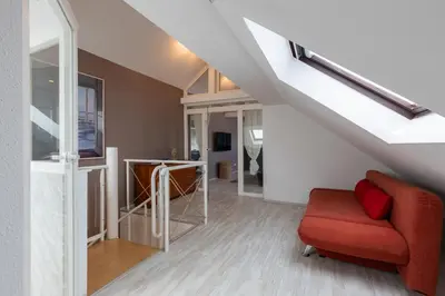 Ein Sitzbereich in der Unterkunft Macabu Premium Apartment Joker,Chemnitz