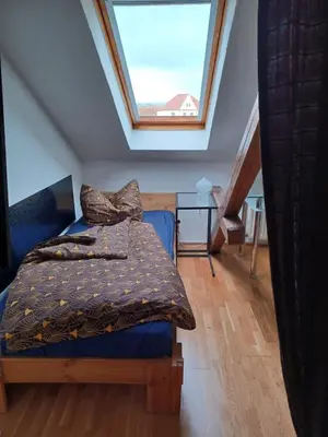 Ein Bett oder Betten in einem Zimmer der Unterkunft Stadtvilla Nichterlein