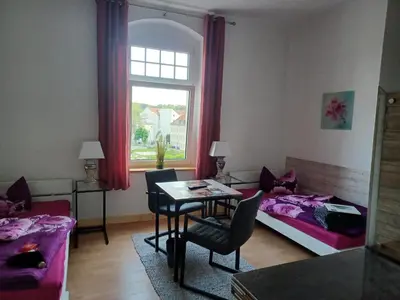 Ein Bett oder Betten in einem Zimmer der Unterkunft Stadtvilla Nichterlein