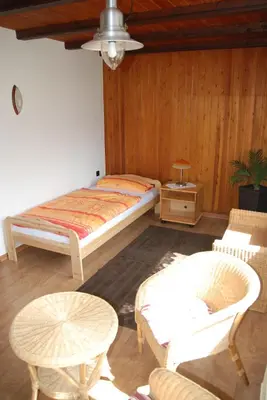 Ein Bett oder Betten in einem Zimmer der Unterkunft Ferienwohnung - Chayenne Apartment mit 2 Schlafzimmern