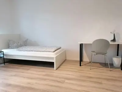 Ein Bett oder Betten in einem Zimmer der Unterkunft Wohnung I Monteur I WiFi