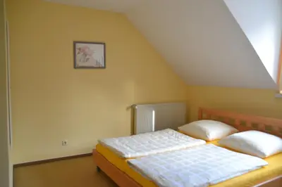 Ein Bett oder Betten in einem Zimmer der Unterkunft Pension Altwahnsdorf