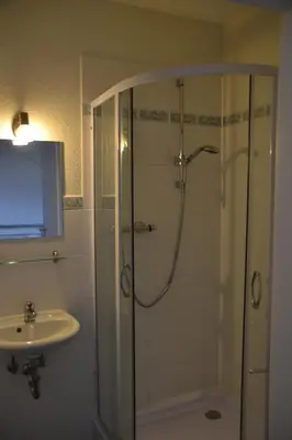 Ein Badezimmer in der Unterkunft Pension Altwahnsdorf