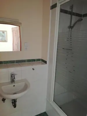 Ein Badezimmer in der Unterkunft Pension Altwahnsdorf