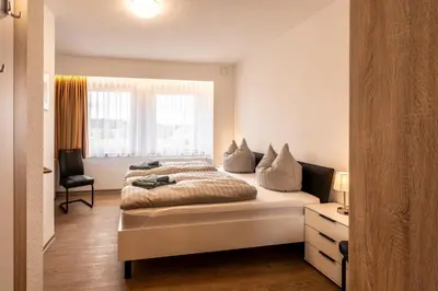 Ein Bett oder Betten in einem Zimmer der Unterkunft Pension Resort Dreistern