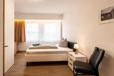 Ein Bett oder Betten in einem Zimmer der Unterkunft Pension Resort Dreistern