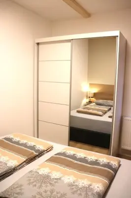 Ein Bett oder Betten in einem Zimmer der Unterkunft Ferienhaus mit Garten und Tor zur Dresdner Heide