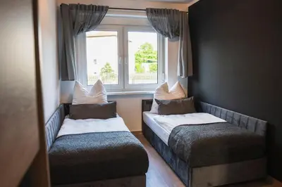 Ein Bett oder Betten in einem Zimmer der Unterkunft Ferienhaus zum Johannisthal