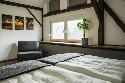 Ein Bett oder Betten in einem Zimmer der Unterkunft Ferienhaus zum Johannisthal