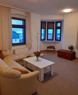 Ein Sitzbereich in der Unterkunft Großzügige, komfortable Wohnung