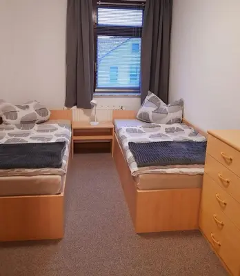 Ein Bett oder Betten in einem Zimmer der Unterkunft Großzügige, komfortable Wohnung