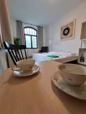 Ein Bett oder Betten in einem Zimmer der Unterkunft Ausblick Freital 5