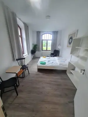Ein Bett oder Betten in einem Zimmer der Unterkunft Ausblick Freital 5
