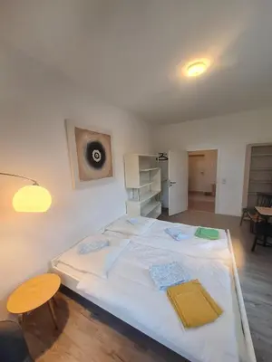 Ein Bett oder Betten in einem Zimmer der Unterkunft Ausblick Freital 5