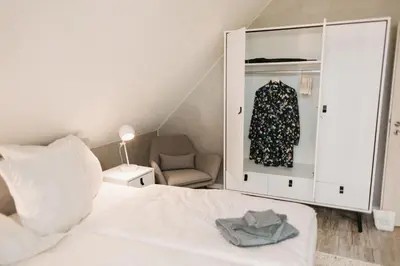 Ein Bett oder Betten in einem Zimmer der Unterkunft TOLE Ferienunterkunft