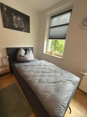 Ein Bett oder Betten in einem Zimmer der Unterkunft Am Stadtrand