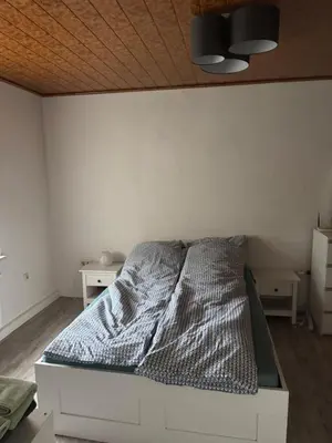 Ein Bett oder Betten in einem Zimmer der Unterkunft Ferienhaus Frida