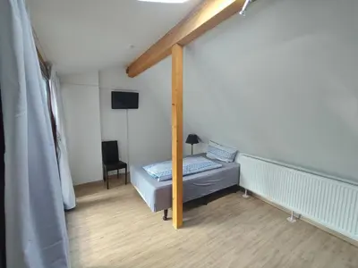 Ein Bett oder Betten in einem Zimmer der Unterkunft Ferienwohnung im Herzen des Lausitzer Seenlandes
