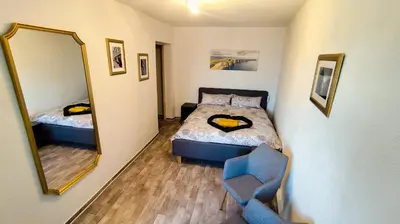 Ein Bett oder Betten in einem Zimmer der Unterkunft Golden Hop Apartments