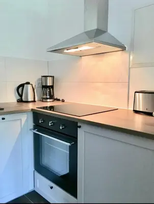 Küche/Küchenzeile in der Unterkunft Charmante Ferienwohnung 1 im Schmöllerhäuschen
