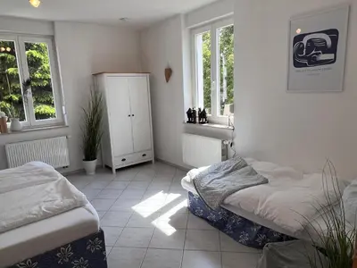 Ein Bett oder Betten in einem Zimmer der Unterkunft Trompeten-, Posaunen- & Tuba-Appartment in Stolpen