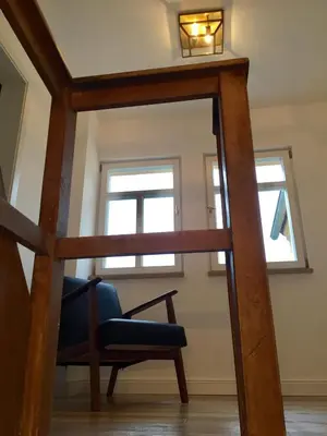 Ein Sitzbereich in der Unterkunft Kleines Ferienappartement 3 im Schmöllerhäuschen