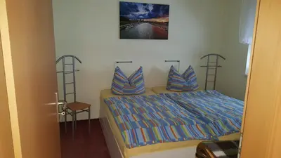 Ein Bett oder Betten in einem Zimmer der Unterkunft Ferienhaus Dönschten