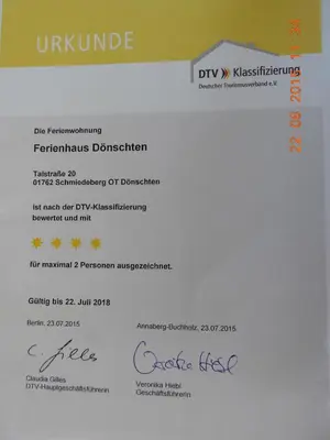 Ein Zertifikat, Auszeichnung, Logo oder anderes Dokument, das in der Unterkunft Ferienhaus Dönschten ausgestellt ist