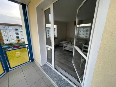 Ein Balkon oder eine Terrasse in der Unterkunft Charming 4-Person Apartment in Hoyerswerda City Center