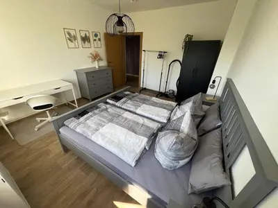 Ein Bett oder Betten in einem Zimmer der Unterkunft Charming 3-Room Apartment in Hoyerswerda, Lusatian Lake District