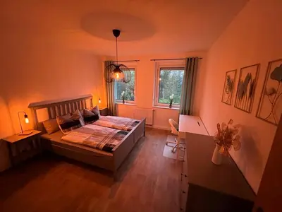 Ein Bett oder Betten in einem Zimmer der Unterkunft Charming 3-Room Apartment in Hoyerswerda, Lusatian Lake District