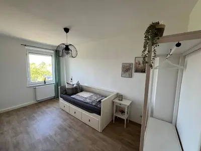 Ein Bett oder Betten in einem Zimmer der Unterkunft Charming 3-Room Apartment in Hoyerswerda, Lusatian Lake District