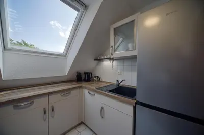 Küche/Küchenzeile in der Unterkunft DresdenStay 3 Schlafzimmer 2 Bäder Balkon Kamin PS4
