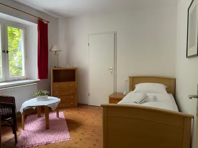 Ein Bett oder Betten in einem Zimmer der Unterkunft Gartenwohnung