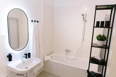 Ein Badezimmer in der Unterkunft stay-a-while Apartment I Etta - Hans I WLAN, kostenloser Parkplatz, Waschmaschine