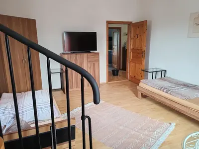 Ein Bett oder Betten in einem Zimmer der Unterkunft Elbe Quartier Meißen Wohnung 13