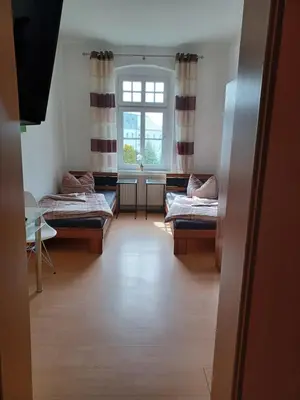 Ein Bett oder Betten in einem Zimmer der Unterkunft Elbe Quartier Meissen TOP MONTEURUNTERKÜNFTE Wohnung 11
