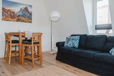 Ein Sitzbereich in der Unterkunft One4Five Apartments, Strandhaus, gemütliches Wohnen in Dresden