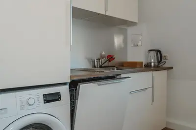 Küche/Küchenzeile in der Unterkunft One4Five Apartments, Strandhaus, gemütliches Wohnen in Dresden