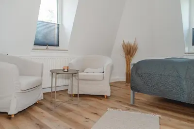 Ein Sitzbereich in der Unterkunft One4Five Apartments, Strandhaus, gemütliches Wohnen in Dresden