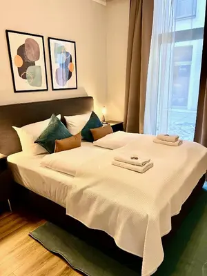 Ein Bett oder Betten in einem Zimmer der Unterkunft Dresden Frauenkirche 8 Personen