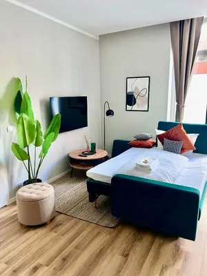 Ein Bett oder Betten in einem Zimmer der Unterkunft Dresden Frauenkirche 8 Personen