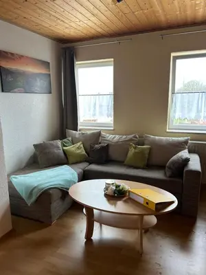 Ein Sitzbereich in der Unterkunft Ferienwohnung Am Lilienstein