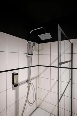 Ein Badezimmer in der Unterkunft Black & White Apartment - Balkon, Netflix, Nespresso, Zentral, Messe